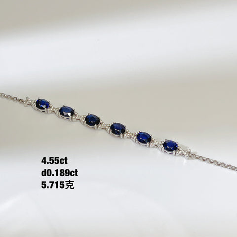 Oval Blue Sapphire Bracelet with X pave-set diamond